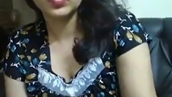 Big-Breasted Indian Auntie Engages In Steamy Video Chat With Her Lover