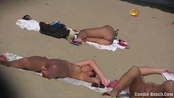 Uninhibited Couples Bare All In Candid Beach Setting Captured By Hidden Camera