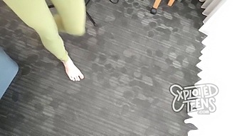 Young Woman Wearing Yoga Pants Gives Oral Sex To A Well-Endowed Man