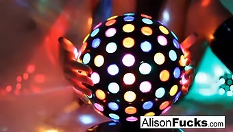Alison Tyler, A Busty Beauty, Dances Seductively In Front Of A Disco Ball